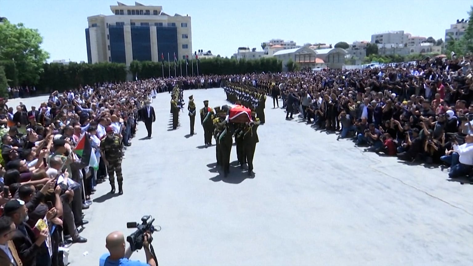 Palestinians honour slain journalist during memorial service in Ramallah