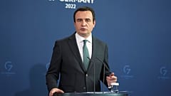 Kosovo's Prime Minister Albin Kurti addresses the media during a press conference in Germany.