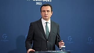 Kosovo's Prime Minister Albin Kurti addresses the media during a press conference in Germany.
