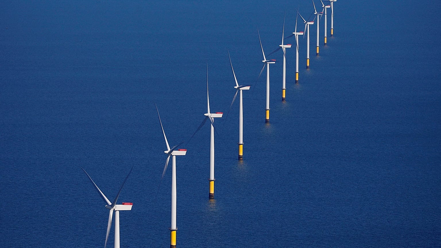 General view of the Walney Extension offshore wind farm operated by Orsted off the coast of Blackpool, Britain.