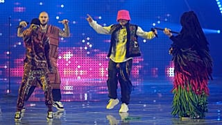Украинская рэп-группа Kalush Orchestra на сцене в Турине, 13 мая 2022 г.