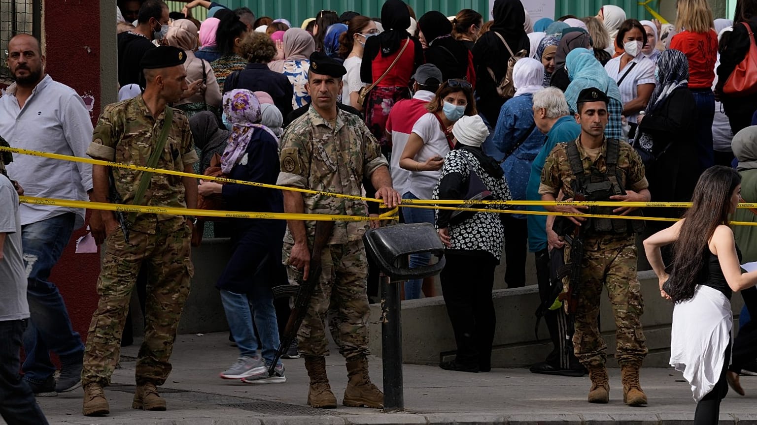 People line up to vote during parliamentary elections in Beirut, Lebanon Sunday, May 15, 2022.