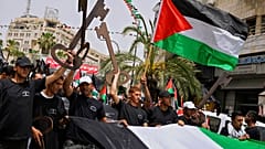 La bandiera della Palestina e le simboliche chiavi delle case dei palestinesi. (Ramallah, 15,5,2022)