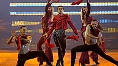 WRS from Romania singing Llamane performs during the Grand Final of the Eurovision Song Contest at Palaolimpico arena, in Turin, Italy, Saturday, May 14, 2022. 