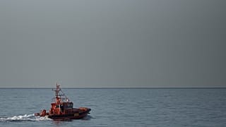 A Spanish coast guard boat patrols off the coast of Almeria.