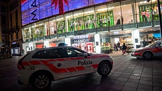 A police car in the area where a stabbing occurred in Lugano.