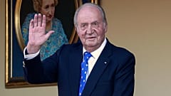Spain's former King Juan Carlos waves during a bullfight at the bullring in Aranjuez, Madrid, Spain, Sunday, June 2, 2019