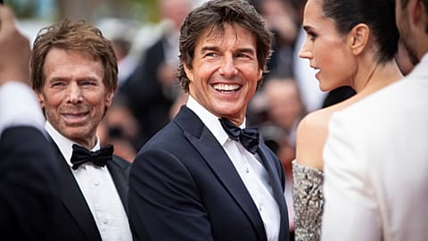 Tom Cruise poses for photographers upon arrival at the premiere of the film 'Top Gun: Maverick' at the 75th international film festival, Cannes, southern France, Wednesday, Ma