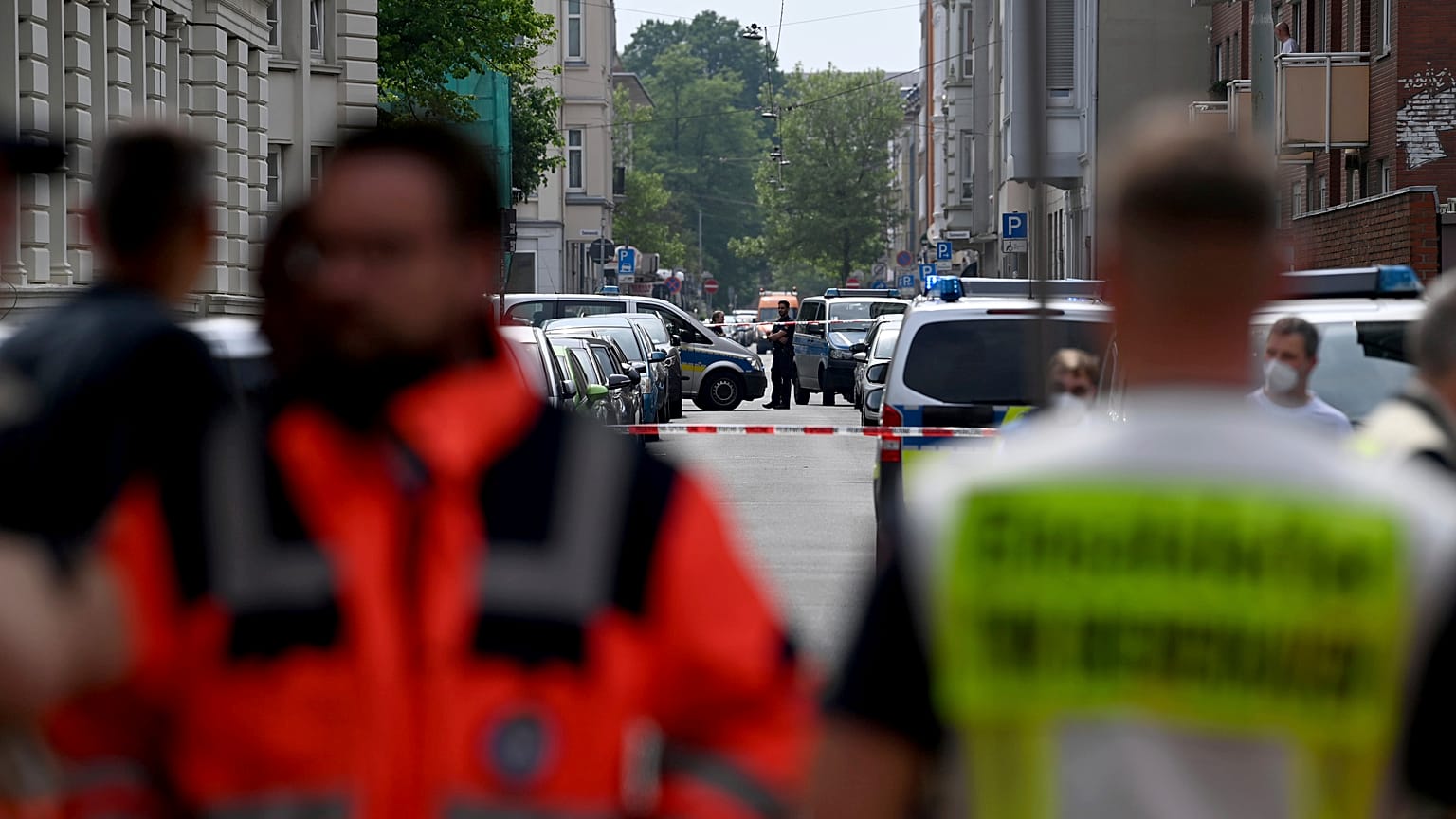 Police and emergency forces stand near a school in Bremerhaven, Germany, Thursday, May 19, 2022.