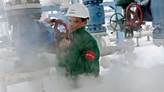 An engineer checks the pressure in the pipeline pumping natural gas out of the underground storage near the Ukrainian border in Hajduszoboszlo, Hungary, Jan. 7, 2009.