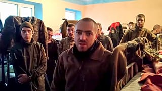 Ukrainian servicemen in a penal colony in Olyonivka, territory under the Donetsk People's Republic's control, after leaving the besieged Azovstal plant in Mariupol.