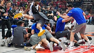 Anadolu Efes' players celebrate at the end of a Final Four Euroleague semifinal basketball match between Olympiacos and Anadolu Efes, in Belgrade.