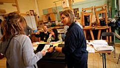 People cast their votes at a polling station in Brussels for the 2019 European Parliament elections.