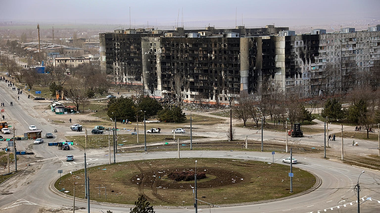 Damage is seen on apartment buildings after shelling from fighting on the outskirts of Mariupol in late March 2022