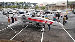 People look over Dr. Akaki Lekiachilli's near life-like replica of an X-Wing Starfighter from Star Wars, which was designed by Cantwell.