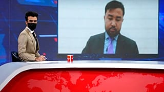 TOLONews sunucularından Hamed Bahram  yayında maske takarak kadın meslektaşlarına destek verdi