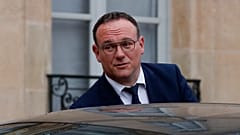 New French Minister of Solidarity Damien Abad leaves the Elysee Palace on Monday.