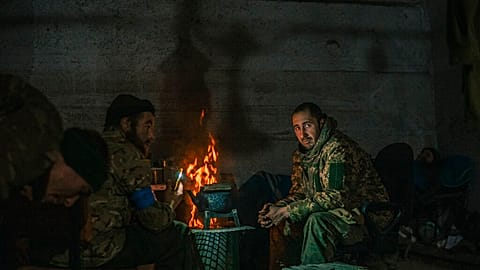 Ukrainian soldiers inside the ruined Azovstal steel plant take a rest in their shelter in Mariupol, Ukraine, May 7, 2022.