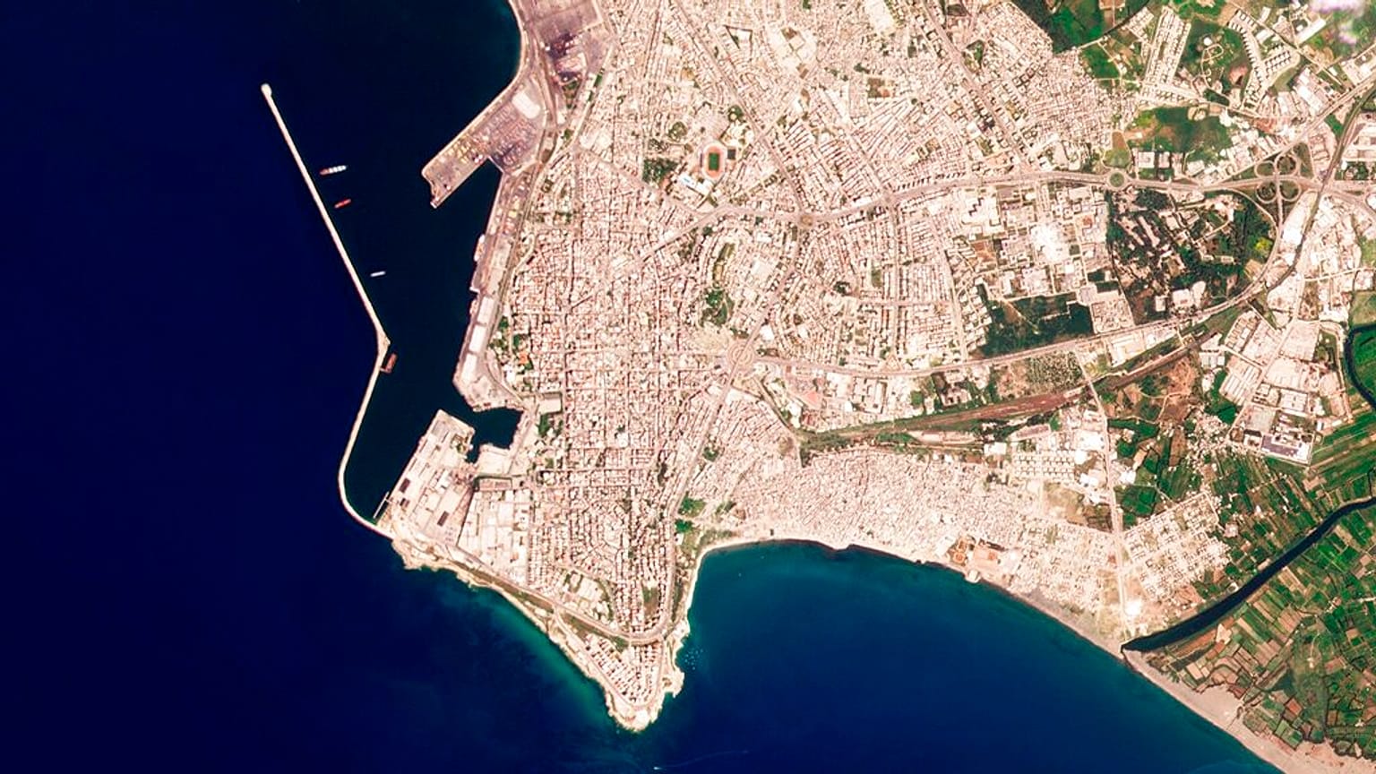Satellite photos analyzed by AP on Wednesday showed the Russian-flagged Matros Pozynich believed to be carrying stolen Ukrainian grain inside the harbor of Latakia