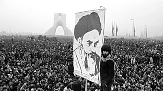Demonstrators hold up a poster of Ayatollah Khomeini, the former supreme leader of Iran, during a protest in Tehran, 10 Dec, 1978. 