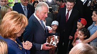 Britain's Prince Charles and Princess Margaret, the Custodian of the Romanian Crown, visit a centre for refugees fleeing the war in Ukraine, in Bucharest, Romania.