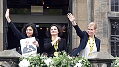 Svetlana Tikhanovskaya, center, Veronika Zepkalo, right, and the sister of Maria Kalesnikava receive the Charlemagne Prize in Aachen, Germany
