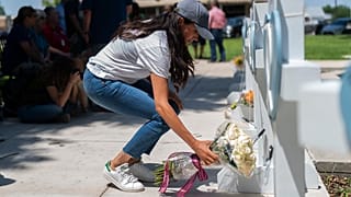 Meghan Markle, Duchess of Sussex, visits a memorial site, Thursday, May 26, 2022, honoring the victims killed in Tuesday's elementary school shooting in Uvalde, Texas,