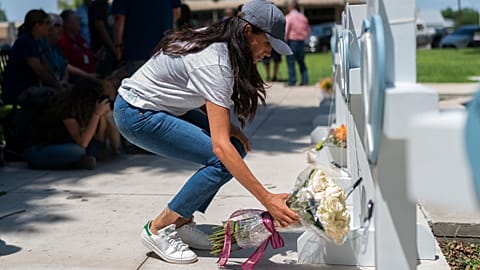 Meghan Markle, Duchess of Sussex, visits a memorial site, Thursday, May 26, 2022, honoring the victims killed in Tuesday's elementary school shooting in Uvalde, Texas,