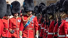 FILE - Britain's Prince William, Colonel of the Irish Guards, inspects the 1st battalion in the Quadrangle of Windsor Castle, 17 May 2022