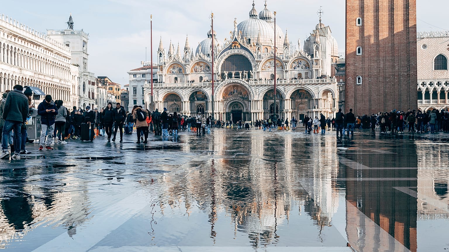 Venice’s transport, industry and tourism rely on water, but the sea is also threatening to submerge the fragile city. 