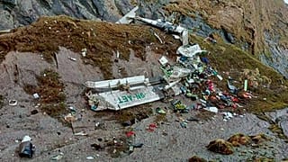 This handout photograph released by Fishtail Air, shows the wreckage of a plane in a gorge in Sanosware in Mustang district close to Jomsom, west of Kathmandu, Nepal. 