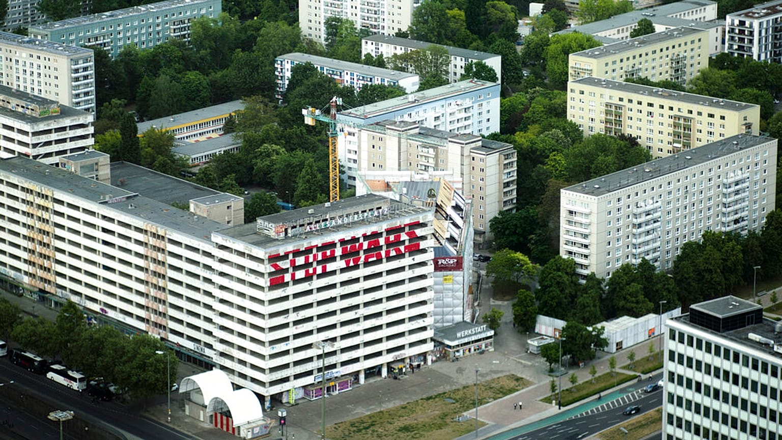 The slogan 'Stop Wars' is painted at the facade of an abandoned office building at a residencial area near the Alexanderplatz in central Berlin, Germany, Monday, May 16, 2022.