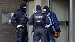 Covid-19 dolandırıcılarının peşindeki Alman polisi baskınları arttırdı