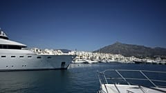 Yachts are seen in Puerto Banus luxury marina and shopping complex in Marbella on March 2, 2022.