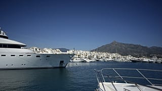 Yachts are seen in Puerto Banus luxury marina and shopping complex in Marbella on March 2, 2022.