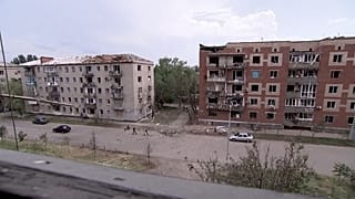 Residential buildings damaged by an overnight missile.