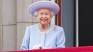 Queen Elizabeth II watches from the balcony of Buckingham Place after the Trooping the Color ceremony in London to mark the Platinum Jubilee. June 2, 2022