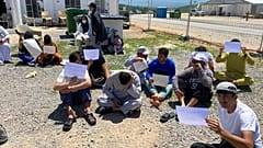 Afghans who fled the Taliban takeover of their country staging a protest at Camp Bondsteel in Kosovo, Wednesday, June 1, 2022. 