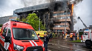 Russian Emergency Situation ministry's firefighters work at the scene of a fire that broke out at a business center in Moscow, Russia, Friday, June 3, 2022. 