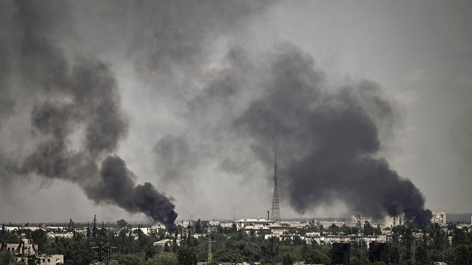 Smoke rises in the city of Severodonetsk during heavy fighting on May 30, 2022. 