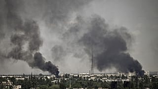 Smoke rises in the city of Severodonetsk during heavy fighting on May 30, 2022. 