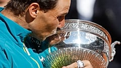 Spain's Rafael Nadal kisses the cup after defeating Norway's Casper Ruud in their final match of the French Open tennis tournament on 5 June 2022
