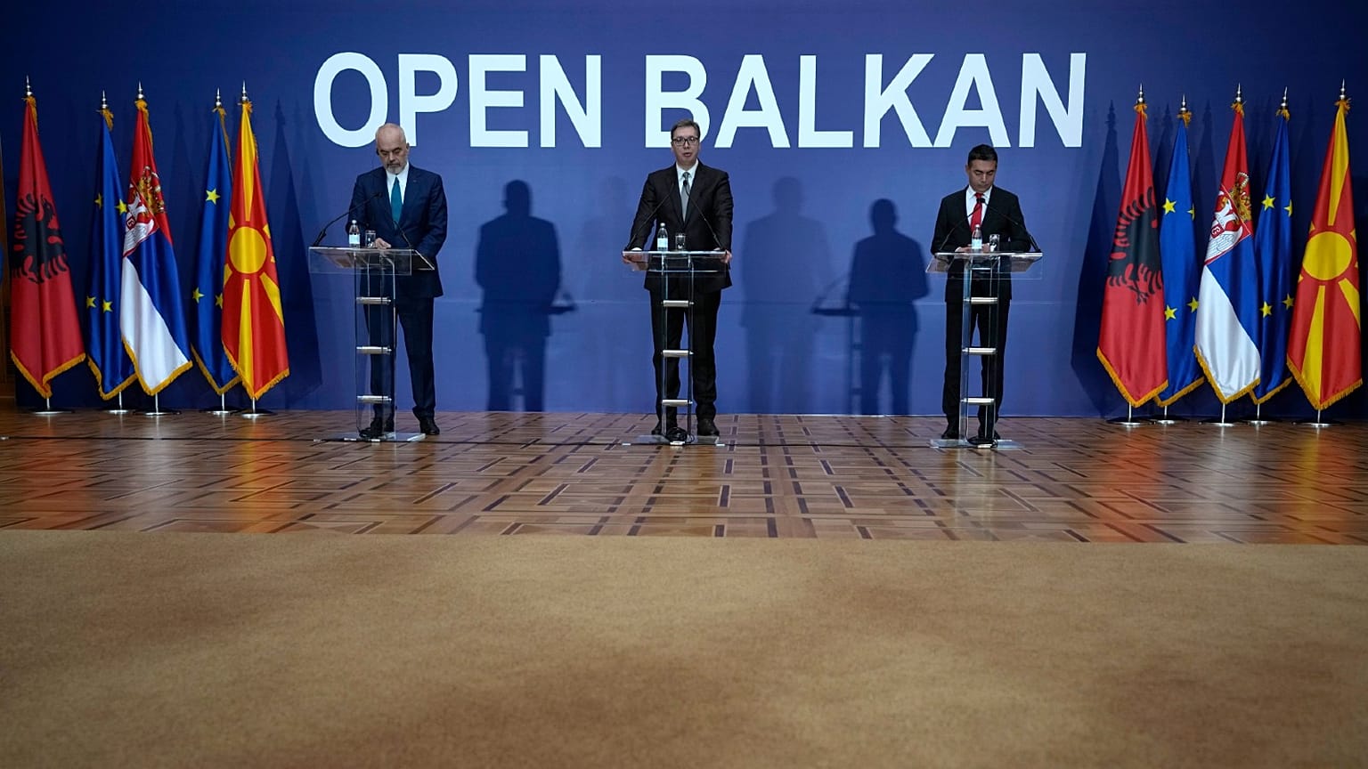 Serbian President Aleksandar Vucic, center, speaks during a press conference with Albanian Prime Minister Edi Rama, left, and North Macedonia Deputy PM Nikola Dimitrov