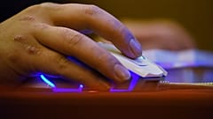 File photo: A man uses a computer in an internet cafe.