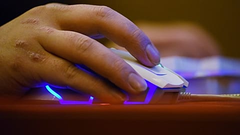 File photo: A man uses a computer in an internet cafe.