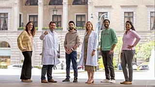 Four people who were successfully treated for rectal cancer in the Memorial Sloan Kettering trial join the trial's two principal investigators