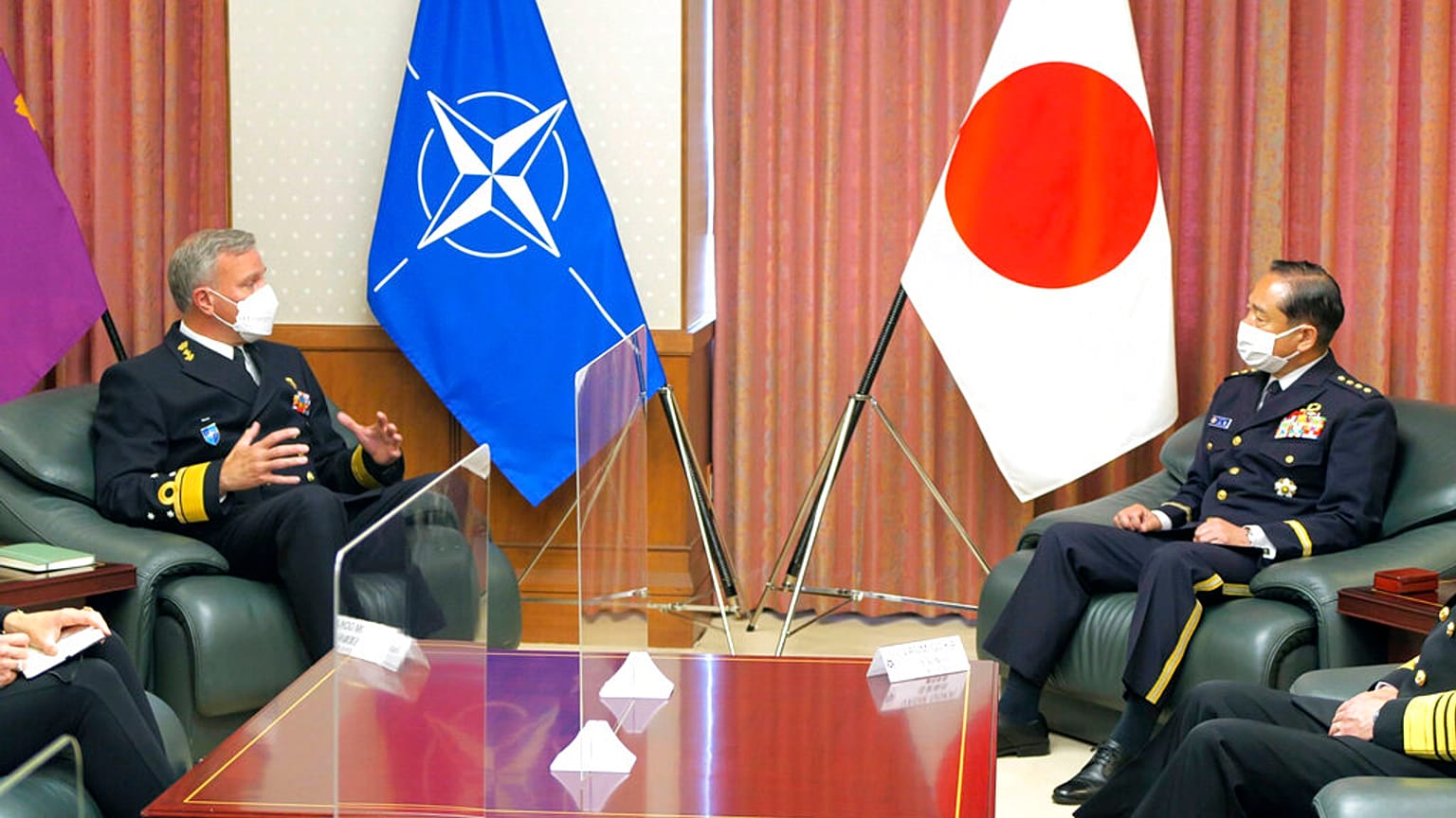 NATO Military Committee chief Rob Bauer, left, meets with Japanese Chief of Staff Koji Yamazaki