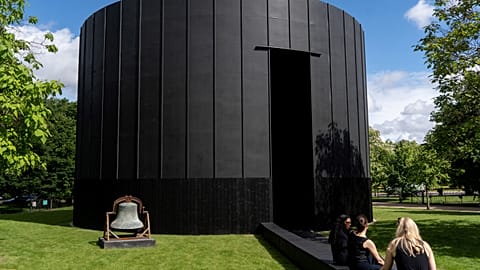 Theaster Gates has unveiled the cylindrical Black Chapel as this year's Serpentine Pavilion in London