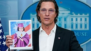 McConaughey holds a picture or Alithia Ramirez, 10, who was killed in the mass shooting at the Uvalde elementary school last month.