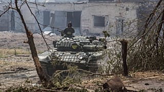 Smoke and dirt rise from the city of Severodonetsk during fighting between Ukrainian and Russian troops at the eastern Ukrainian region of Donbas on June 14, 2022.